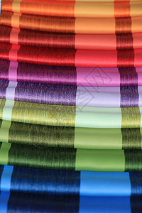 商店里的织物样品材料家居面料收藏零售纺织品组织设计商业展示背景图片