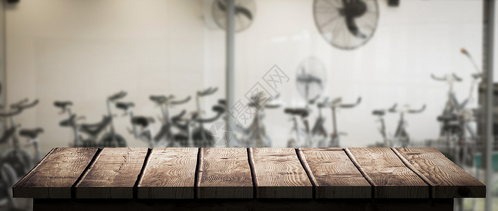 木制地板复合图像纺纱运动机运动旋转娱乐地面自行车器材健身健身室背景图片