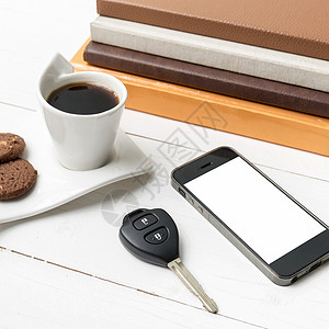 电话加素材咖啡杯加饼干 手机 车钥匙和书本桌子办公室细胞工作网络咖啡眼镜电话笔记本杯子背景