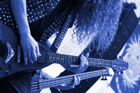 吉他员音乐会电气手指行动电吉他重金属吉他乐队活力独奏背景图片