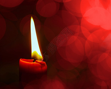 蜡烛火焰灯芯红色背景图片