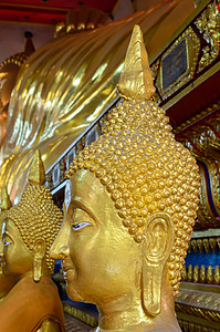 佛祖的脸很近沉思眼睛信仰大佛宗教雕像场景金子金色上帝背景图片