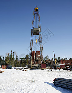 石油钻井机 石油工业设备技术钻头天空机器蓝色气体燃料萃取钻机平台背景图片