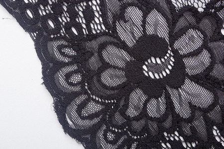 Lacy 黑色布料针织蕾丝褶皱编织白色花边纺织品装潢工作室织物背景图片