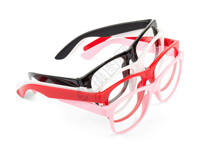 一套双眼眼镜镜片粉色光学手表框架塑料背景图片