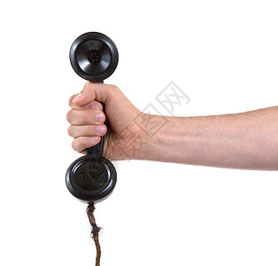 男性手持旧式地面电话假期失败商业电缆固定电话拨号水池电子产品技术铃声背景图片