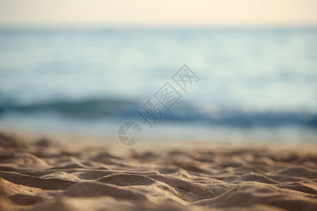 海滩的沙子蓝色天空假期地平线风景海岸海洋自然热带背景图片