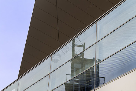 关于奥地利维也纳现代建筑的抽象观点奥地利维也纳玻璃天空办公室商业城市房子窗户蓝色线条背景图片