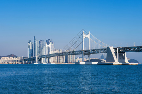韩国釜山的光安桥和海云台城市通道海堤天空景观海景交通运输建筑市中心背景图片