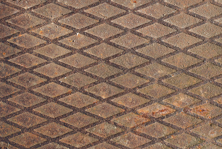 旧铁板上的对角图案对角线底板材料网格金属工业背景图片