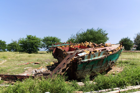 废旧木船废金属材质破坏古董木材拆除背景图片