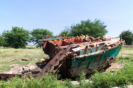 废旧木船破坏废金属木材拆除古董材质背景图片