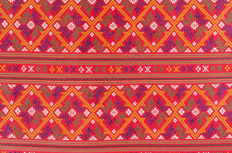 泰国锡尔丝绸材料红色传统墙纸纺织品文化工匠衣服手工背景图片
