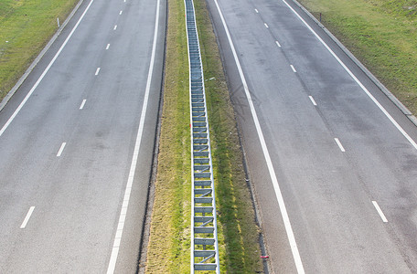 荷兰的空无公路沥青摄影赛道旅行乡村天空绿色场地天气路线背景图片