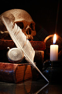 旧书和史库尔艺术蜡烛文学火焰手表智慧时间颅骨工具古董背景图片