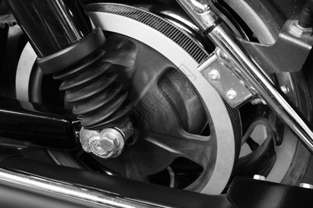 黑色和白色摩托车式的紧紧腰带驱动车轮合金摩托车艺术菜刀自行车发动机驾驶背景图片