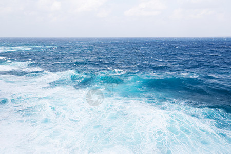 海洋波浪乐趣天气海岸天空力量冲浪者碰撞蓝色冲浪热带背景图片