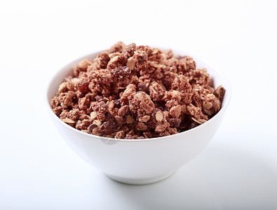 巧克力颗粒坚果谷物小吃紧缩零食燕麦麦片脆片早餐背景图片