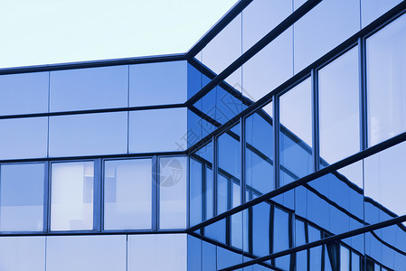 办公大楼中窗户图像的图像城市蓝色镜子展览大厅建筑中心反射商业公司背景图片