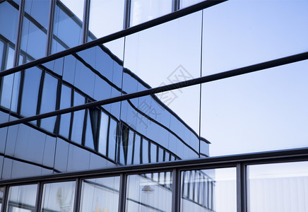 办公大楼中窗户图像的图像建筑商业玻璃展览金融蓝色建筑学反射摩天大楼旅行背景图片