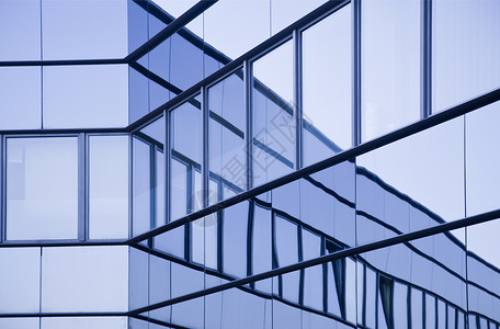 办公大楼中窗户图像的图像玻璃旅行商业大厅镜子蓝色公司建筑贸易金融背景图片