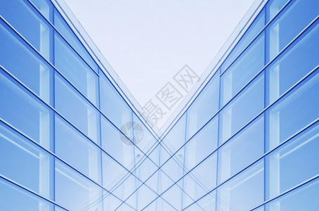 办公大楼中窗户图像的图像反射城市蓝色镜子旅行中心金融技术大厅摩天大楼背景图片
