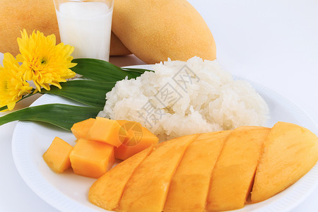 和芒果一起吃泰式甜米 泰国风格的热带甜点叶子奶油椰子美食牛奶季节文化水果营养街道背景图片