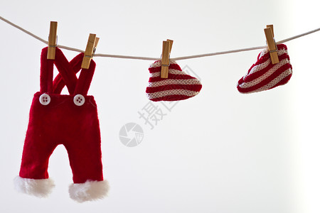 圣诞节装饰品裤子红色季节性装饰季节纹饰背景图片