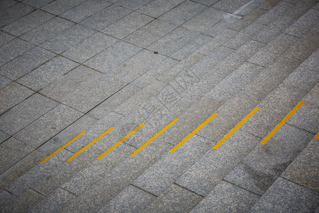 花岗岩台广场脚步楼梯城市黄色灰色地面正方形建筑梯子背景图片