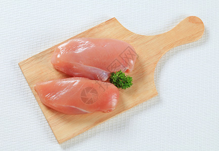 新鲜鸡乳蛋火鸡砧板食品库存胸肉食物鱼片背景图片