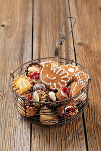 圣诞饼干水果团体篮子馅饼糕点巧克力杏仁甜点食物金属背景图片