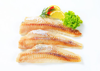 新鲜鱼片柠檬熏制库存白鱼煤鱼食物鳕鱼鲶鱼高架背景图片