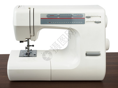白色背景上孤立的缝纫机纺织品高清图片素材
