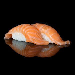 黑色的鱼沙门寿司美食芝麻黑色菜单反射海藻爬虫海鲜饮食食物背景