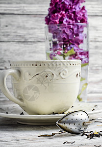 果冻茶和杯子勺子粉色早餐香水花束铭文花瓣饮料香气背景图片
