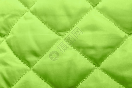 用于锤击的白色绗缝织物质地涤纶材料绿色毯子刺绣被子墙纸粮食空白纺织品背景图片