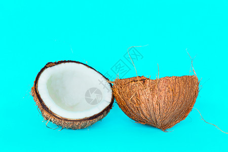 椰子分为两部分宏观异国棕色情调食物植物产品热带棕榈休息背景图片