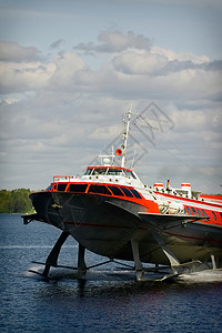 水上流油船冲浪海岸飞行流星旅游假期海浪天空溅射乘客背景图片