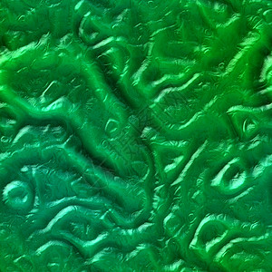 外星人滑雪波浪生物折叠绿色黄色皮肤宏观黑色塑料反射背景图片