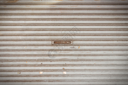 生锈钢铁滑门背景图片