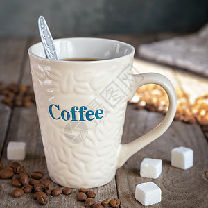 在旧板上喝咖啡的麻瓜木头饮料作品早餐粮食咖啡桌面白色香气勺子背景图片