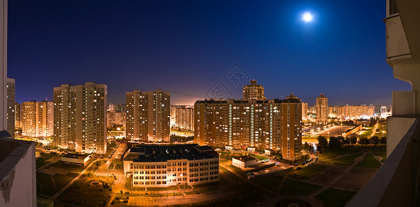 爱情公寓诺澜莫斯科夜幕全景辉光天空中心高楼月亮摩天大楼天际汽车旅行蓝色背景