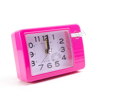 闹钟时间指针手表粉色背景图片
