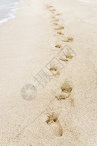 沙脚足迹天空摄影蓝色海浪消失男性水平冲浪海滩海景高清图片