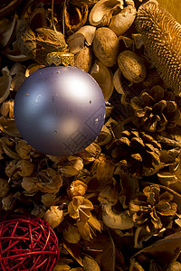 干燥植物和鲜花坚果Aroma治疗新年玩具疗法棕色花朵温泉叶子花香芳香盘子背景图片