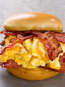 美国烤培根蛋和芝士三明治流鼻涕早餐熏肉食物背景图片