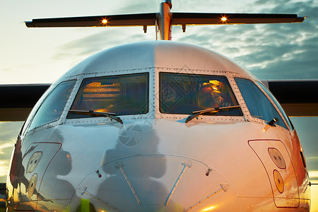 飞机驾驶舱飞机场控制航天工业队长日出日落运输客机阴影地勤背景图片
