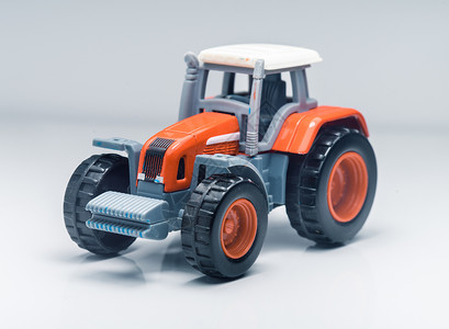 儿童塑料玩具拖拉机车辆拖带农机农田园艺机械化牵引力拉机收成农具背景