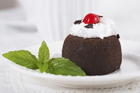 核仁巧克力饼巧克力甜甜蛋糕蛋饼在盘子上饼干勺子美食烘烤蛋糕坚果可可糖类装饰品糕点背景