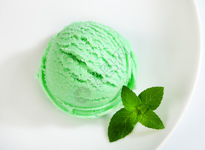 绿雪花冰冻甜点食物酸奶绿色盘子蜜露小吃果子绿茶背景图片